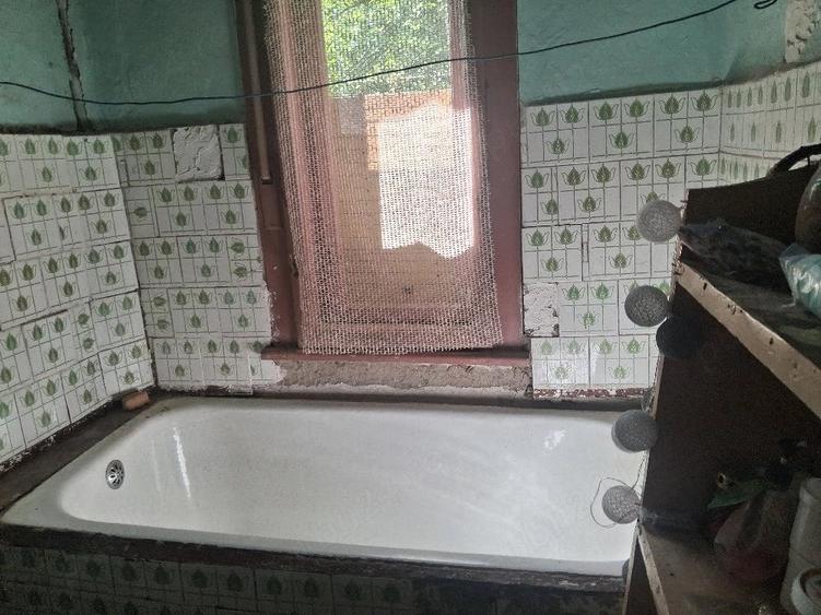 Casă cu Teren 1370 Mp în Căpruța