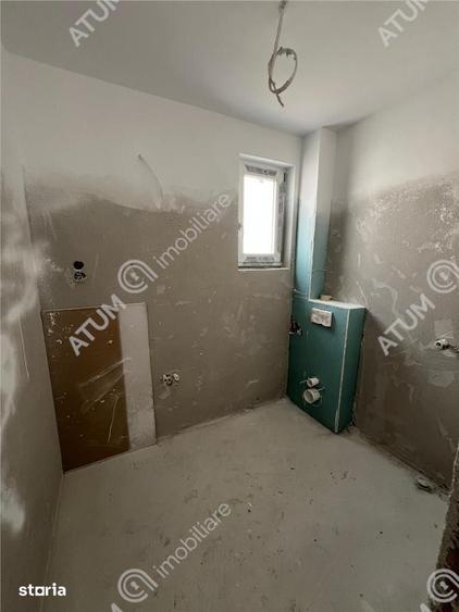 Casa cu 4 camere 2 bai curte de 50 mp zona Calea Cisnadiei Sibiu - 2