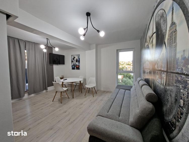 Apartament cu 2 camere semidecomandat, mobilat în Dâmbul Rotund