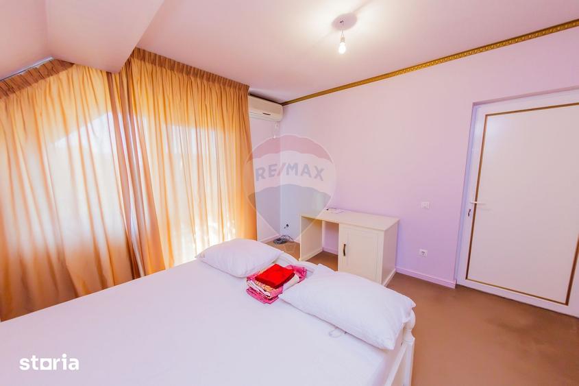 Casa cu 7 camere, 10 ari de vanzare la drumul principal cu 2 intrari - 17
