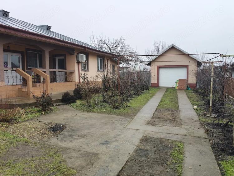 Casă cu Teren 1000 Mp în Central
