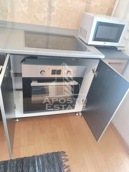 Apartament cu 3 camere semidecomandat, mobilat în Micălaca