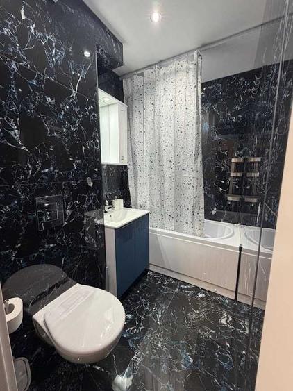 Apartament cu 2 camere semidecomandat în Podu Roș