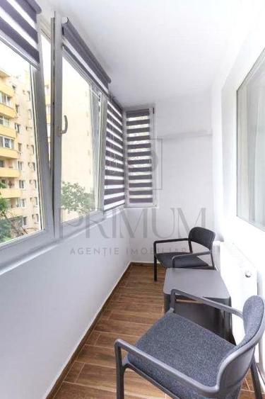 Apartament cu 3 camere semidecomandat, mobilat în Central