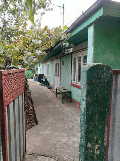Casă cu Teren 1000 Mp în Central