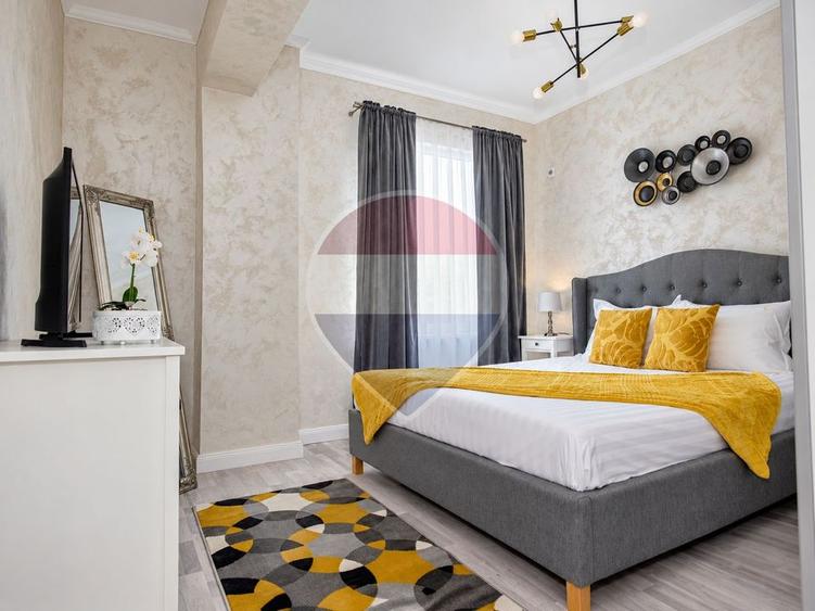 Apartament cu 2 camere semidecomandat, mobilat în Central