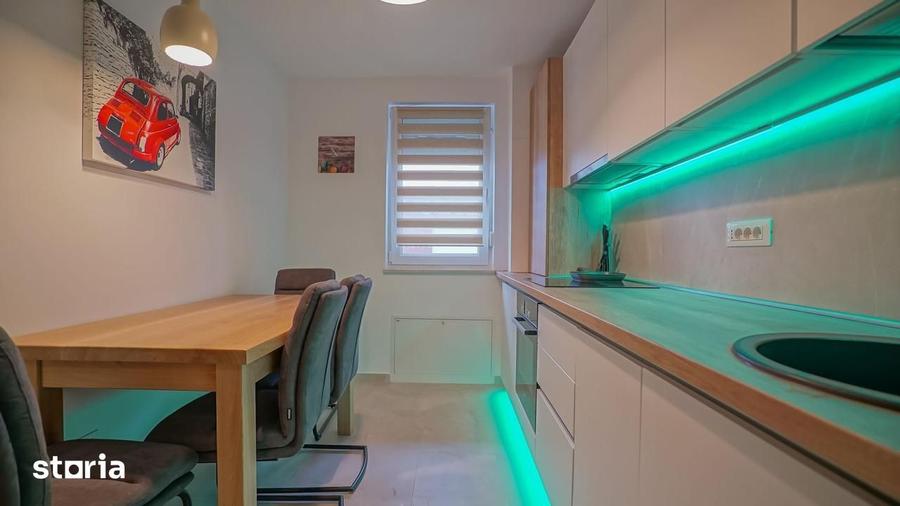 Apartament cu 2 camere decomandat în Tractorul