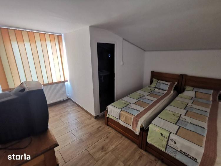 Casă cu 4 camere cu Teren 1000 Mp în Central