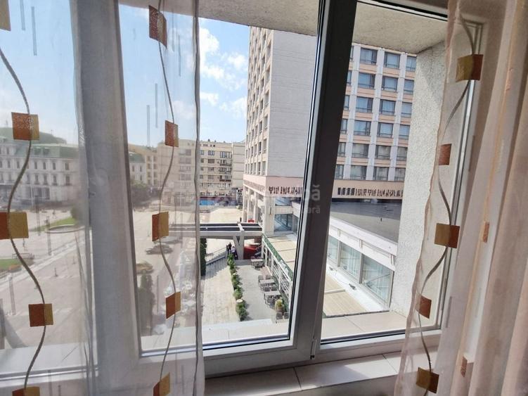Apartament cu 2 camere semidecomandat, mobilat în Central
