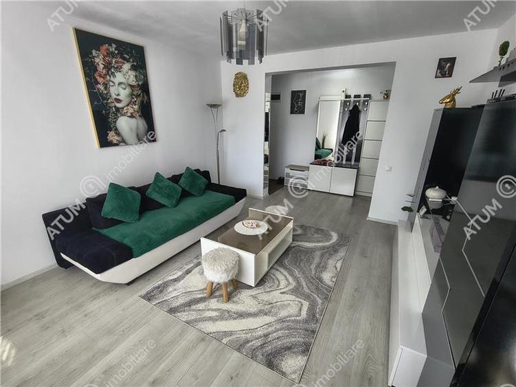 Apartament cu 2 camere decomandate balcon si loc de parcare etajul 1 - 2