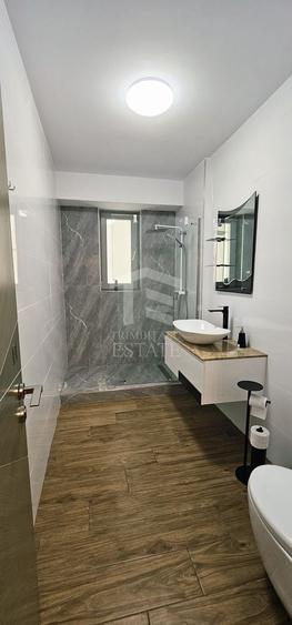Apartament cu 2 camere semidecomandat, mobilat în Central