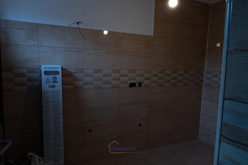 Casă cu 3 camere cu Teren 400 Mp în Comănești