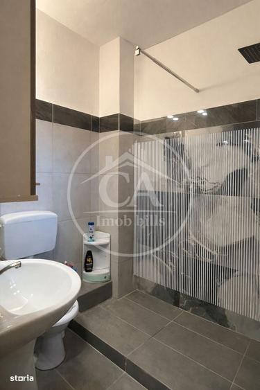 Apartament cu 4 camere decomandat în Rontău