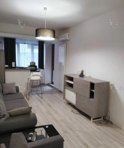 Apartament cu 2 camere semidecomandat, mobilat în Regie