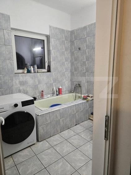 Casă individuală cu 4 camere decomandat cu Canalizare în Titulescu