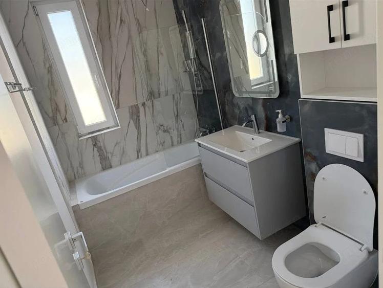 Apartament cu 2 camere semidecomandat în Giroc