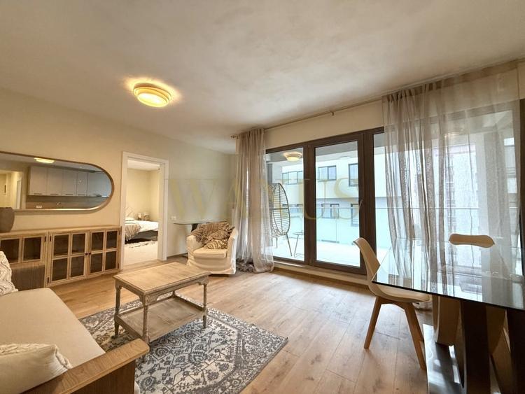 Apartament cu 3 camere semidecomandat, mobilat în Borhanci