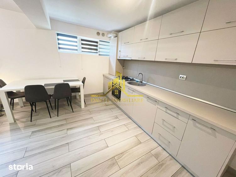 Apartament cu 2 camere semidecomandat, mobilat în Borhanci