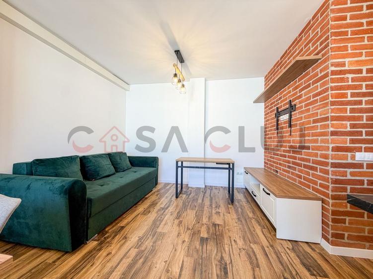 Apartament cu 3 camere semidecomandat, mobilat în Borhanci