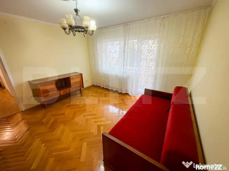 Apartament cu 4 camere semidecomandat, mobilat în 22 Decembrie