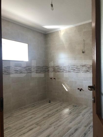 Casă individuală cu 4 camere cu Canalizare în Sânpetru