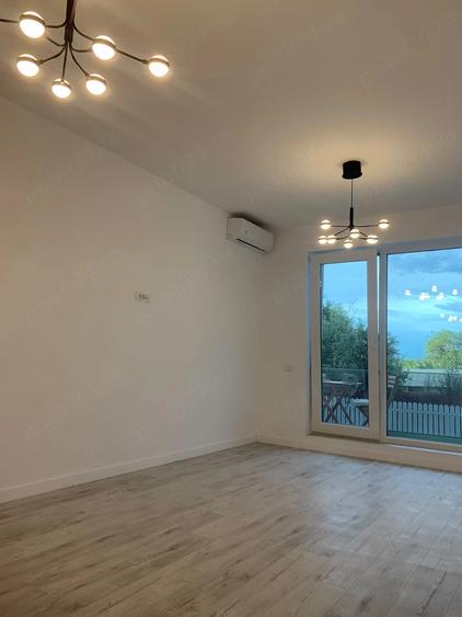 Apartament cu 2 camere decomandat în Tunari