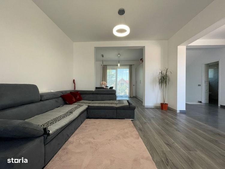 Casa individuala de vanzare cu 4 camere, amplasata pe un teren de 412 - 2