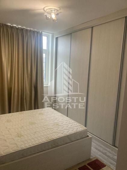 Apartament cu 2 camere semidecomandat, mobilat în Central