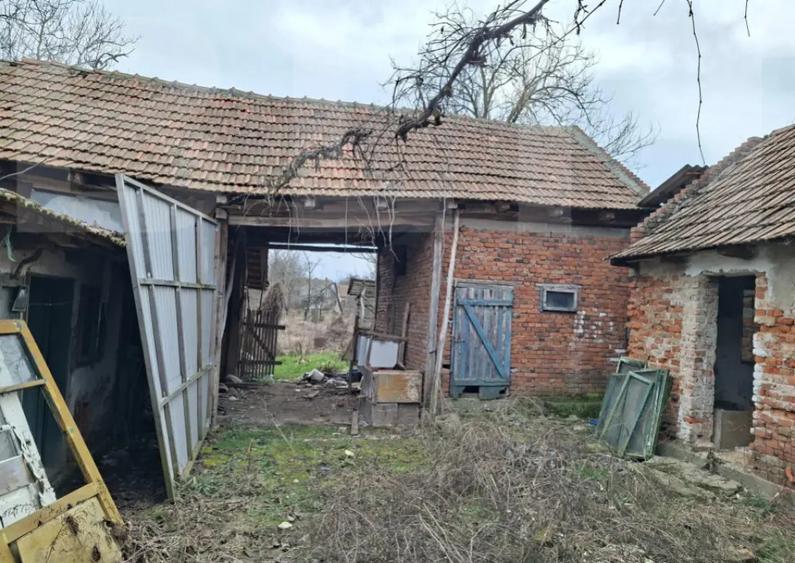 Casă cu 4 camere cu Teren 1000 Mp în Central