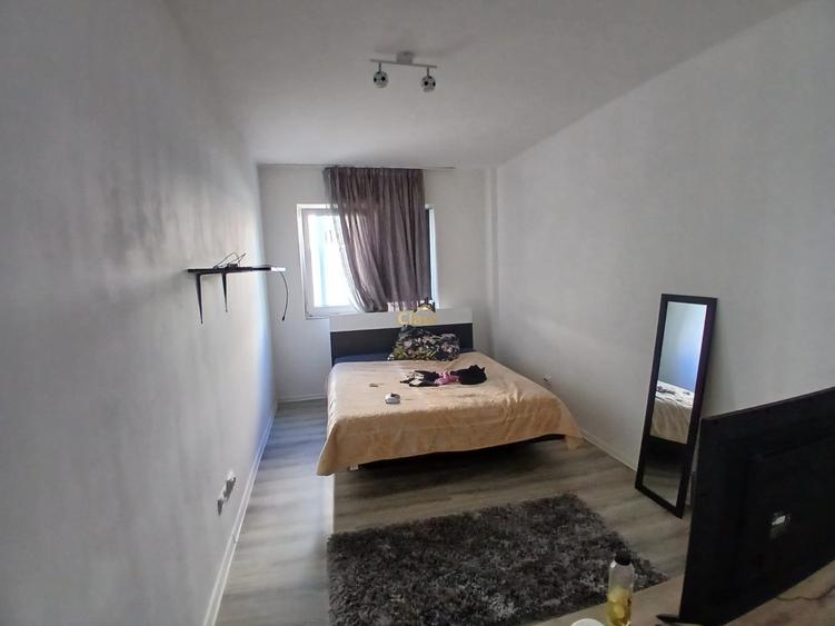 Apartament cu 2 camere semidecomandat, mobilat în Baciu