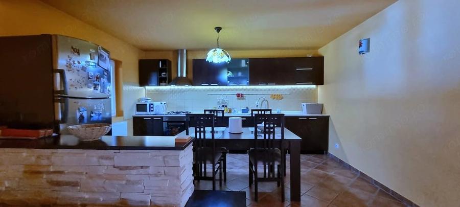 Casă cu Teren 1260 Mp în Buda