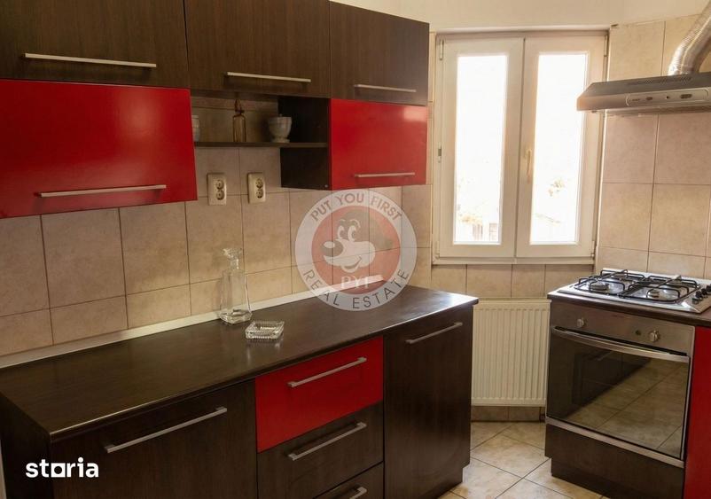 Apartament cu 5 camere decomandat în Romană