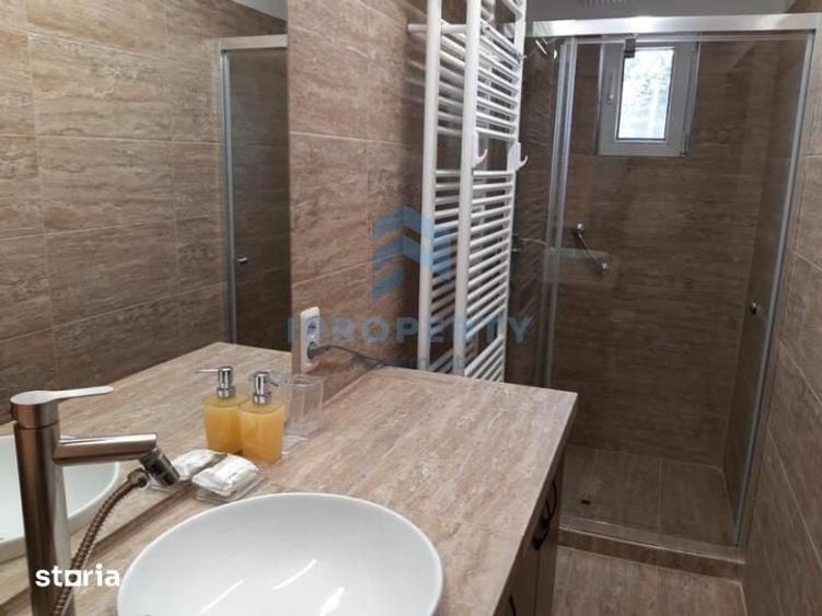 Apartament cu 3 camere decomandat în Romană