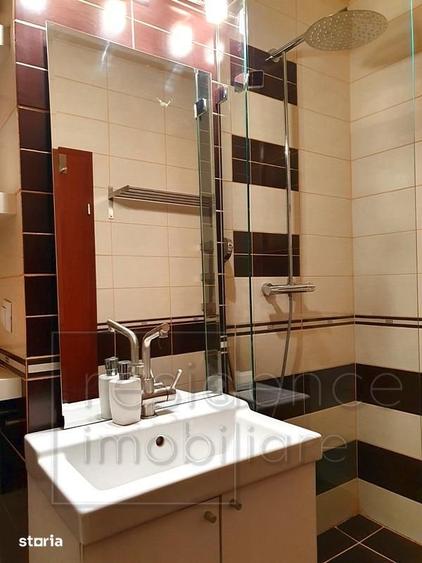 Apartament cu 2 camere semidecomandat, mobilat în Central