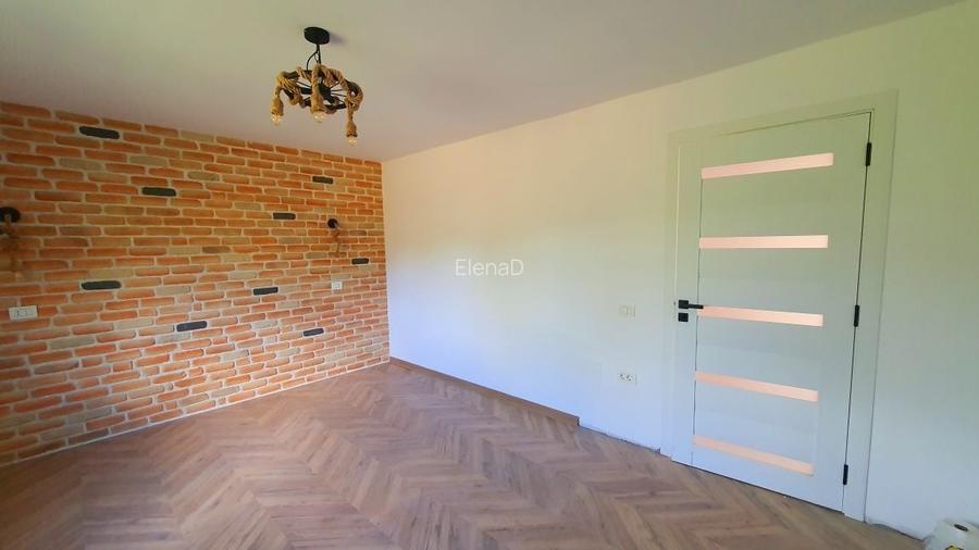 Vand casa noua din caramida.