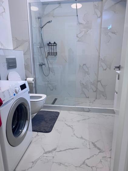Apartament cu 2 camere semidecomandat, mobilat în Central
