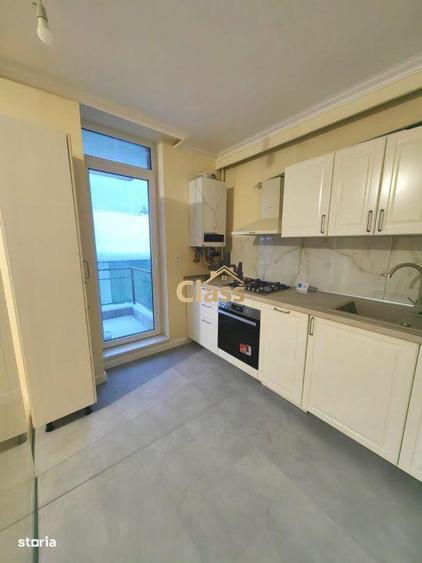 Apartament cu 2 camere semidecomandat, mobilat în Borhanci