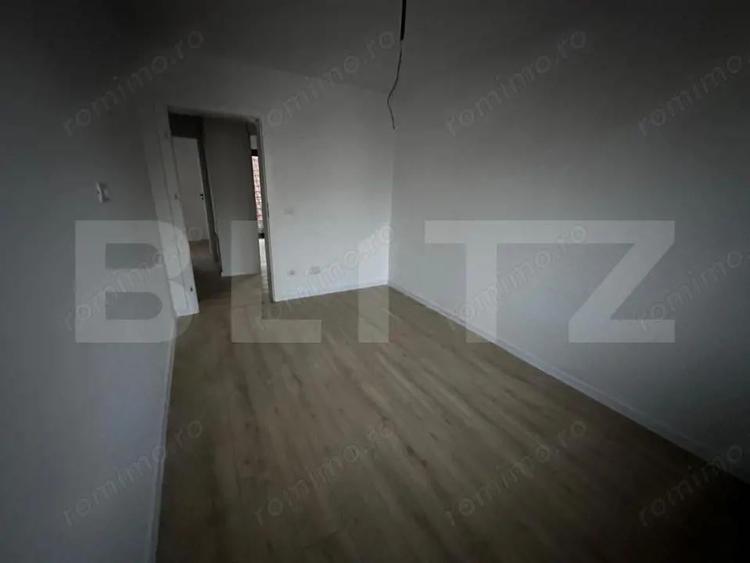 Casă cu 4 camere cu Teren 100 Mp în Central