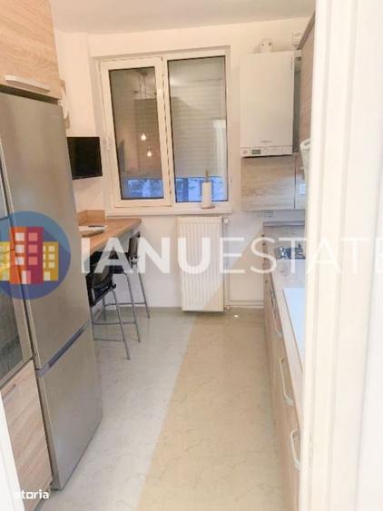Apartament cu 3 camere decomandat în Titan