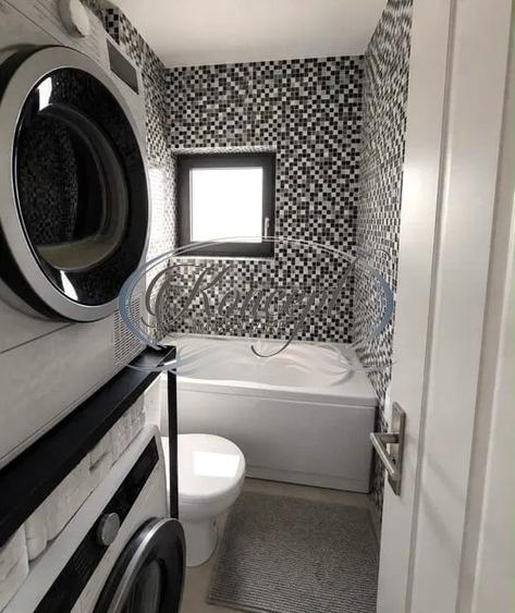 Apartament cu 3 camere semidecomandat, mobilat în Borhanci