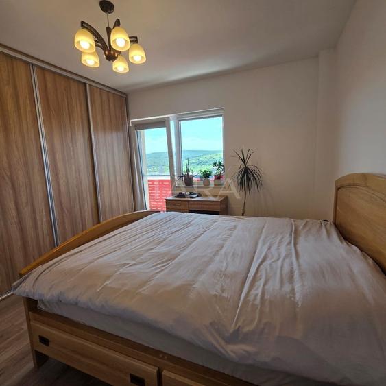 Apartament cu 3 camere semidecomandat, mobilat în Baciu