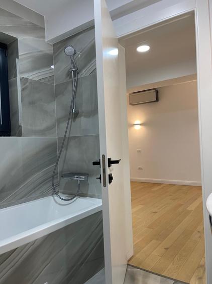 Apartament cu 3 camere semidecomandat, mobilat în Dorobanți