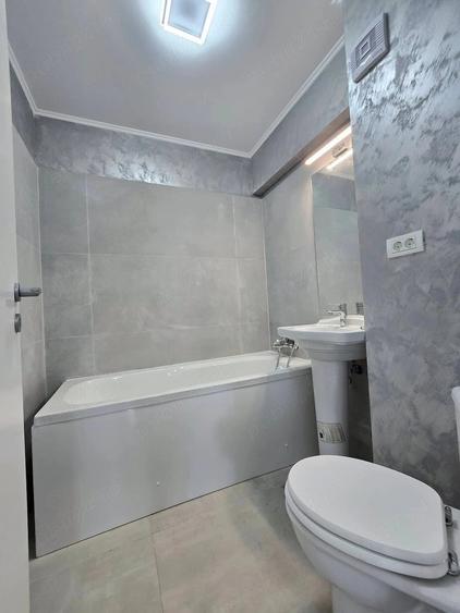 Apartament cu 4 camere decomandat în Dobroești