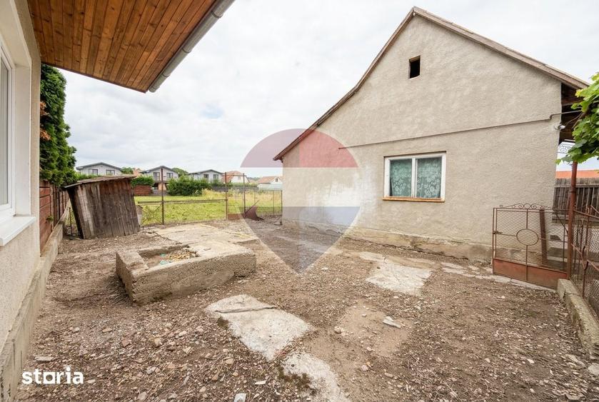 Casă cu 2 camere cu Teren 1330 Mp în Central