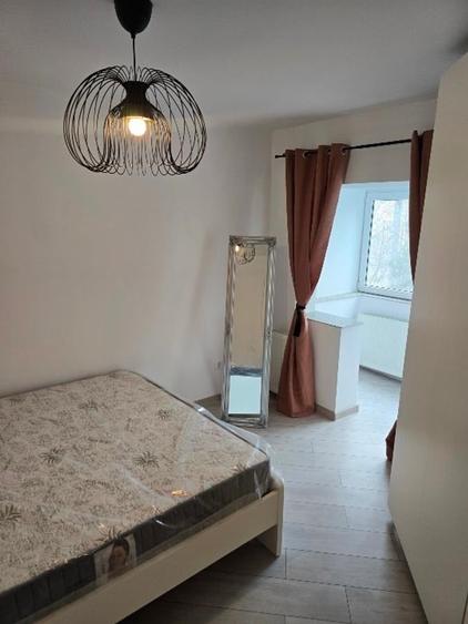 Apartament cu 2 camere, mobilat în Faleza Nord
