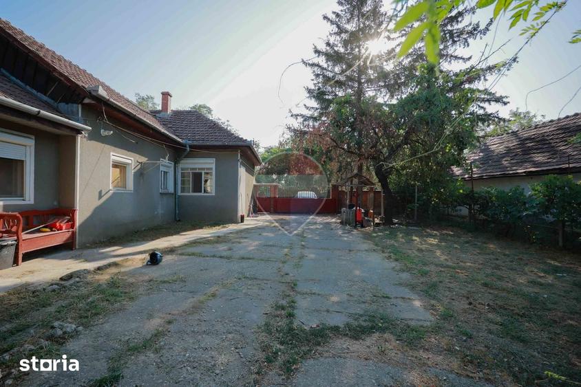 Casă cu 4 camere cu Teren 620 Mp în Borș