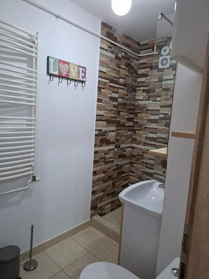 Garsonieră decomandată în Lunei