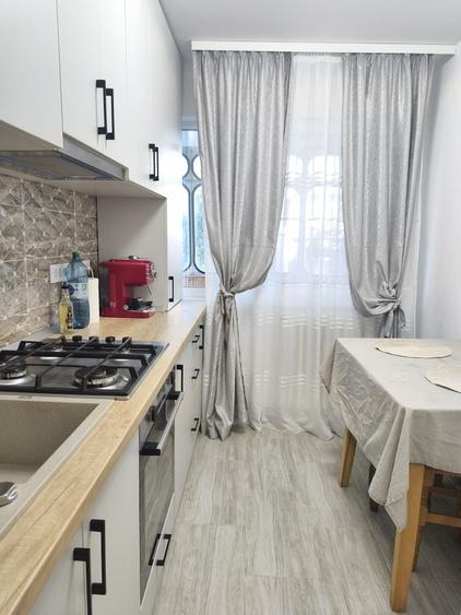 Apartament cu 2 camere semidecomandat în Podu Roș