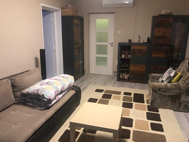 Apartament cu 3 camere semidecomandat în Răcădău