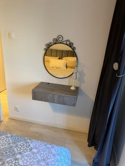 Apartament cu 2 camere semidecomandat, mobilat în Baba Novac